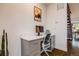 Comfortable home office with modern desk, drawers, and hardwood flooring at 4390 Osage St, Denver, CO 80211