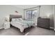 Bedroom with a double bed, carpet, a large window, and a dresser at 2740 W 86Th Ave # 190, Westminster, CO 80031