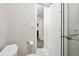 Well-maintained bathroom features modern fixtures and finishes with glass shower door at 5875 E Iliff Ave # 108, Denver, CO 80222