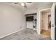 Bedroom with neutral walls, carpeted floor, ceiling fan, and closet with installed shelving at 4533 S Devinney St, Morrison, CO 80465