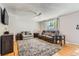 Comfortable living area with a large window for natural light at 4533 S Devinney St, Morrison, CO 80465
