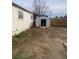 This backyard has a storage shed and is surrounded by a privacy fence at 2017 Ironton St, Aurora, CO 80010