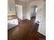 This living room has new laminate flooring and neutral colored walls at 2017 Ironton St, Aurora, CO 80010