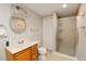 Charming bathroom featuring a shower, vanity, and ample lighting at 9786 Malachite Ct, Parker, CO 80134