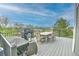 Spacious deck with outdoor dining and a grill, offering beautiful views at 9786 Malachite Ct, Parker, CO 80134