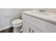 Close-up of bathroom featuring a white vanity, quartz countertop, and modern fixtures at 1401 Bloom St, Brighton, CO 80601