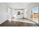 Modern kitchen featuring white cabinetry, a center island, and stainless steel appliances at 1401 Bloom St, Brighton, CO 80601