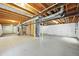 An unfinished basement ready for customization, showing ductwork and exposed wooden beams at 2732 Flint Ct, Superior, CO 80027