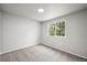 A bright bedroom with a window, neutral walls, and carpet at 2732 Flint Ct, Superior, CO 80027