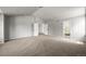 Large bedroom with vaulted ceilings, neutral carpet and adjacent bathroom, offering plenty of space at 2732 Flint Ct, Superior, CO 80027