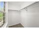 A small walk-in closet with built-in shelving and a window at 2732 Flint Ct, Superior, CO 80027