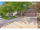 Lovely two-story home with a two-car garage and a well-maintained front yard and mature trees at 2732 Flint Ct, Superior, CO 80027