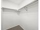 Walk-in closet with metal clothing racks and neutral carpet and white walls at 2732 Flint Ct, Superior, CO 80027