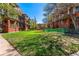 Green space in the center of the complex, offering benches and mature trees for shade at 1356 N Pearl St # 202, Denver, CO 80203