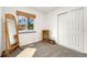 Bright bedroom with closet, large window, and a wooden mirror stands in this comfortable living space at 13388 Alcott Cir, Broomfield, CO 80020