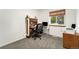 Comfortable bedroom featuring a window, desk, and an executive desk chair offer a great space at 13388 Alcott Cir, Broomfield, CO 80020