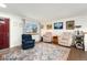 Spacious living room featuring hardwood floors, comfortable seating and large window providing natural light at 13388 Alcott Cir, Broomfield, CO 80020