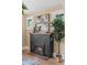 Living room with fireplace and side table lamps at 2271 Holly St, Denver, CO 80207