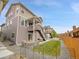 Landscaped backyard featuring a patio with a firepit at 4552 S Perth Ct, Aurora, CO 80015