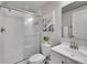 Bathroom featuring a glass shower and sink at 4552 S Perth Ct, Aurora, CO 80015