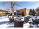 Backyard with seating area and detached garage at 636 York St, Denver, CO 80206