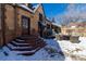 Brick home with a patio and seating area in the backyard at 636 York St, Denver, CO 80206