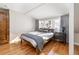 Well-lit bedroom featuring wood floors at 636 York St, Denver, CO 80206