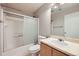 Full bathroom featuring a shower-tub combo, single sink, and neutral wall color at 5653 Raleigh Cir, Castle Rock, CO 80104