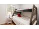 Inviting bedroom with wooden bunk beds and a cozy atmosphere at 192 Little Creek Rd, Idaho Springs, CO 80452