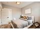 Bedroom with modern decor, comfortable bed, and ample natural light at 2925 E 14Th Ave, Denver, CO 80206