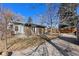 A nicely sized backyard with brick patio at 8721 E Cornell Dr, Denver, CO 80231