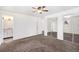 Bedroom with closet, carpet and a bathroom view at 8721 E Cornell Dr, Denver, CO 80231