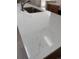 Close up of a kitchen island with sink and countertop at 8721 E Cornell Dr, Denver, CO 80231
