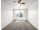 A bedroom with grey carpet and a ceiling fan at 5977 S Rock Creek Dr, Castle Rock, CO 80109