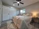 Bedroom featuring a ceiling fan, window, and closet for storing all your clothes at 1250 S Monaco Pkwy # 17, Denver, CO 80224