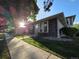 Charming home exterior showcasing stone accents, well-maintained landscaping, and a welcoming entrance at 1250 S Monaco Pkwy # 17, Denver, CO 80224