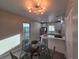 Bright kitchen with modern lighting, stainless appliances, and ample counter space at 1250 S Monaco Pkwy # 17, Denver, CO 80224