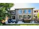 Comfortable backyard patio with a hot tub and outdoor furniture at 10774 Chadsworth Ln, Highlands Ranch, CO 80126