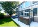 Backyard showcasing a hot tub, outdoor seating, and a lush green lawn, perfect for outdoor living at 10774 Chadsworth Ln, Highlands Ranch, CO 80126