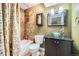 Modern bathroom features a vessel sink, tiled shower, and sleek fixtures at 10774 Chadsworth Ln, Highlands Ranch, CO 80126