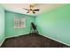 Bright room with a ceiling fan, window with blinds, and carpeted floor at 10774 Chadsworth Ln, Highlands Ranch, CO 80126