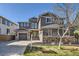 Attractive two-story home featuring a well-kept lawn and multi-car garage at 10774 Chadsworth Ln, Highlands Ranch, CO 80126