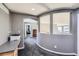 Hallway features an arched doorway leading to an adjacent living space at 10774 Chadsworth Ln, Highlands Ranch, CO 80126
