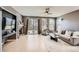 Inviting living room with a fireplace and access to the backyard at 10774 Chadsworth Ln, Highlands Ranch, CO 80126