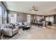 Open-concept living space with neutral colors and sleek flooring at 10774 Chadsworth Ln, Highlands Ranch, CO 80126