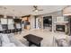 Comfortable living area with a fireplace and views into the kitchen at 10774 Chadsworth Ln, Highlands Ranch, CO 80126