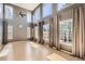 Spacious living room with soaring ceilings and many windows at 10774 Chadsworth Ln, Highlands Ranch, CO 80126