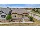 Inviting single-story home showcasing its well-manicured lawn and peaceful neighborhood setting at 13275 E Caley Pl, Centennial, CO 80111