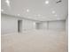 Large finished basement featuring recessed lighting, neutral walls and carpeting, offering flexible living space at 13275 E Caley Pl, Centennial, CO 80111