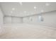 Bright basement with neutral carpet and recessed lighting, multiple windows, perfect for customizable space at 13275 E Caley Pl, Centennial, CO 80111